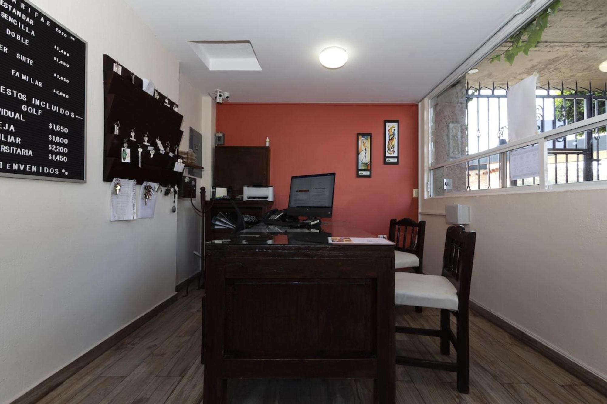 Capital O La Huerta Golf & Hotel Чолула Екстериор снимка