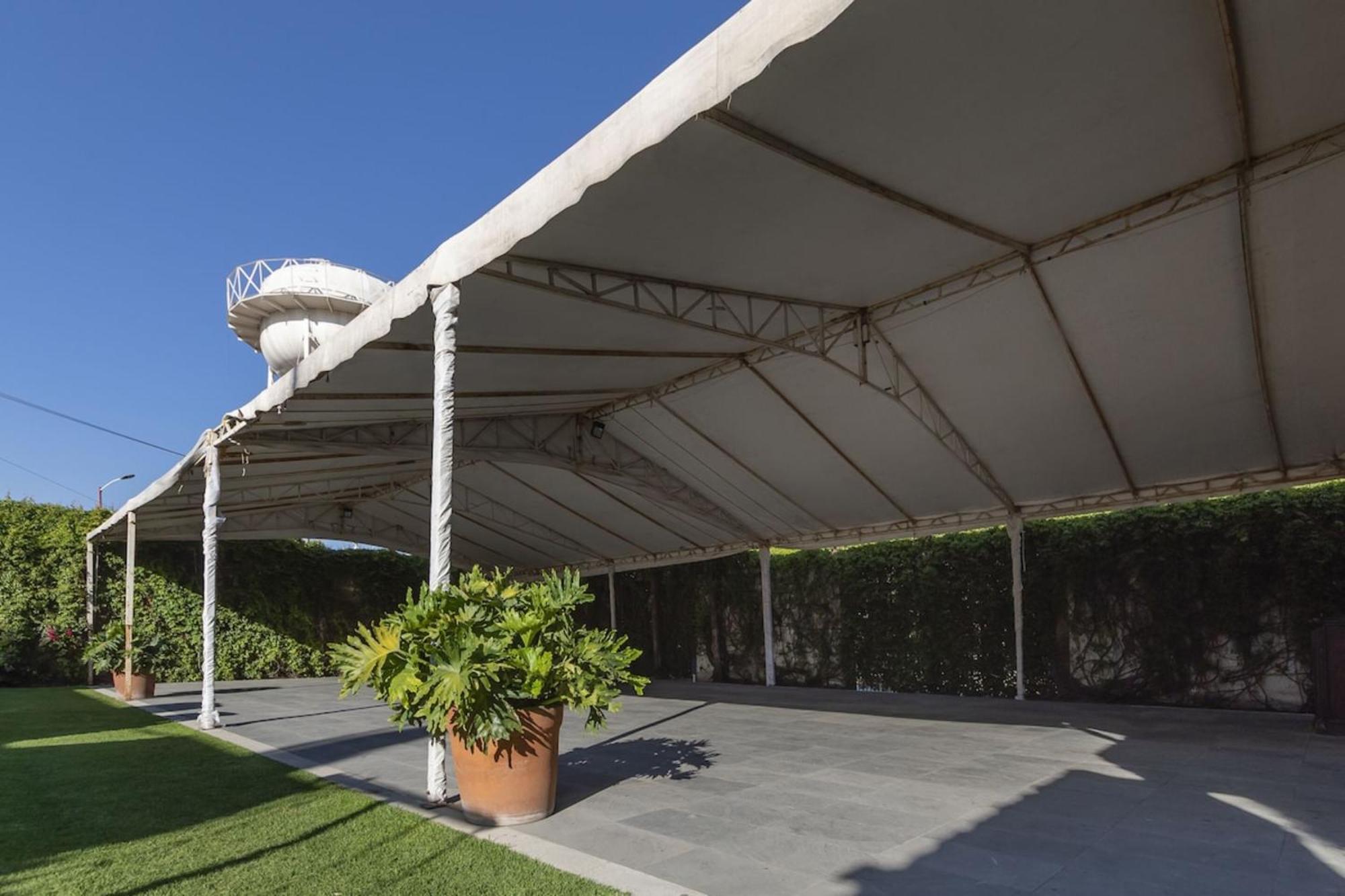 Capital O La Huerta Golf & Hotel Чолула Екстериор снимка